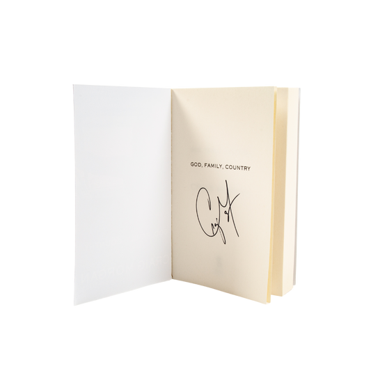 Open book with 'God, Family, Country' text on a white background