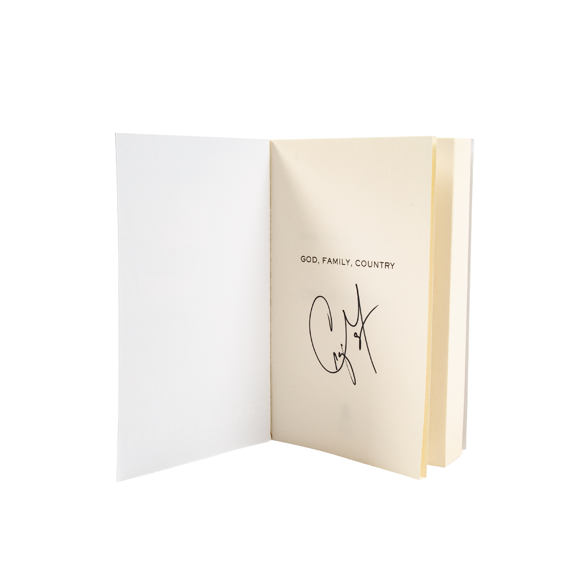 Open book with 'God, Family, Country' text on a white background